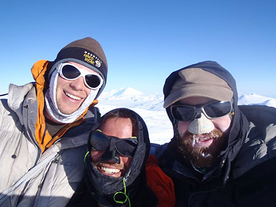 Kyle Thompson, Matt Krisiak and Forest Wagner (L-R) on the summit of Mt. Sanford.