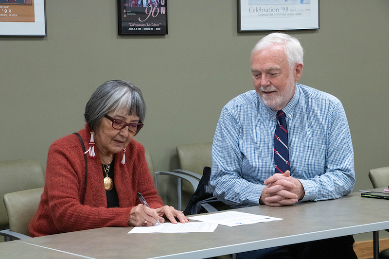 SHI President Rosita Worl, Ph.D., and UAS Chancellor Richard Caulfield, Ph.D., at a recent ceremony to sign a new memorandum of agreement to partner on the PITAAS program. Photo by Lyndsey Brollini, courtesy of Sealaska Heritage Institute.