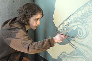  UAS Art Student Jenny Reed painting projected image by Ray Troll