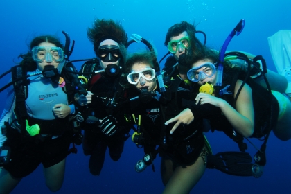 Alison Hadley (far right): UAS outgoing NSE student to Guam
