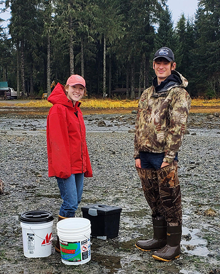 Rose Quitslund and Lathum Johnson collect shellfish in Petersburg to send to Sitka to test for paralytic shellfish toxins.