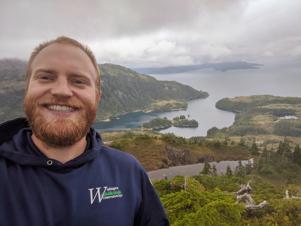 Christopher Conrad poses at PWSAC's Wally Noerenberg Hatchery.